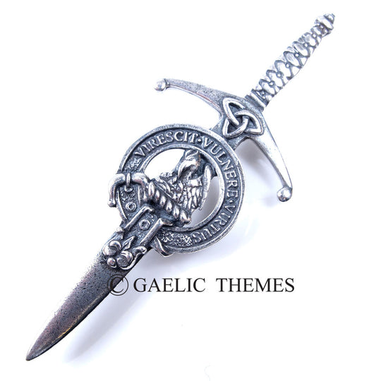 An elegantly designed silver dagger embellished with a Scottish crest, emphasizing its cultural importance and artistic value.