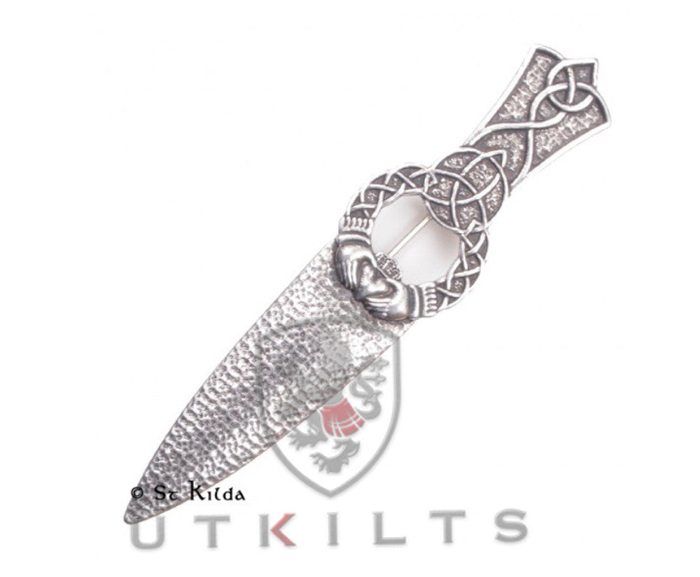 Claddagh Knot, representing Irish heritage and unity.