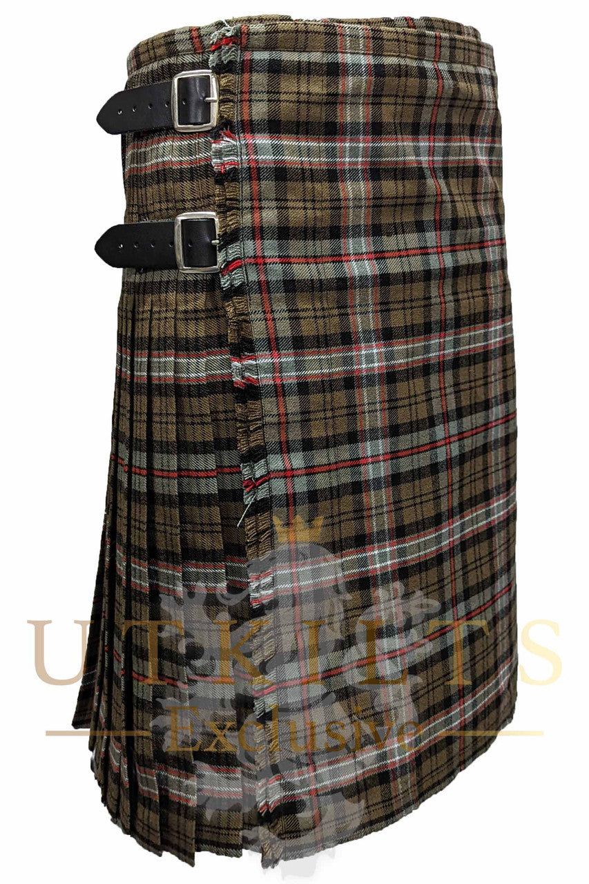 A stylish brown tartan kilt with black buckles, highlighting the exclusive collection from UTK Exclusives.