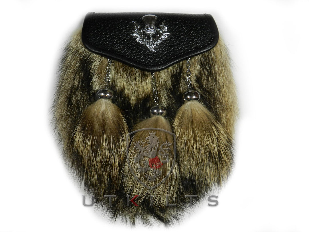 A black fur pouch featuring a metal chain and two decorative tassels, elegantly designed for style and functionality.