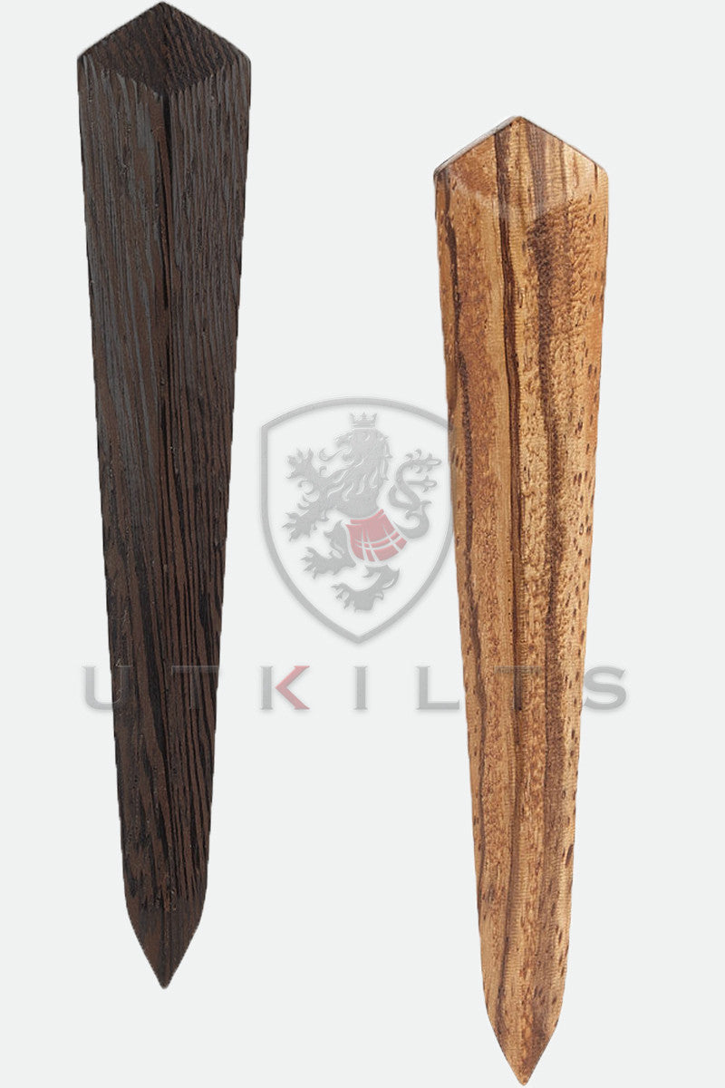 Two wooden pieces representing the Premium Stravaig Kilt Pin crafted from wood.