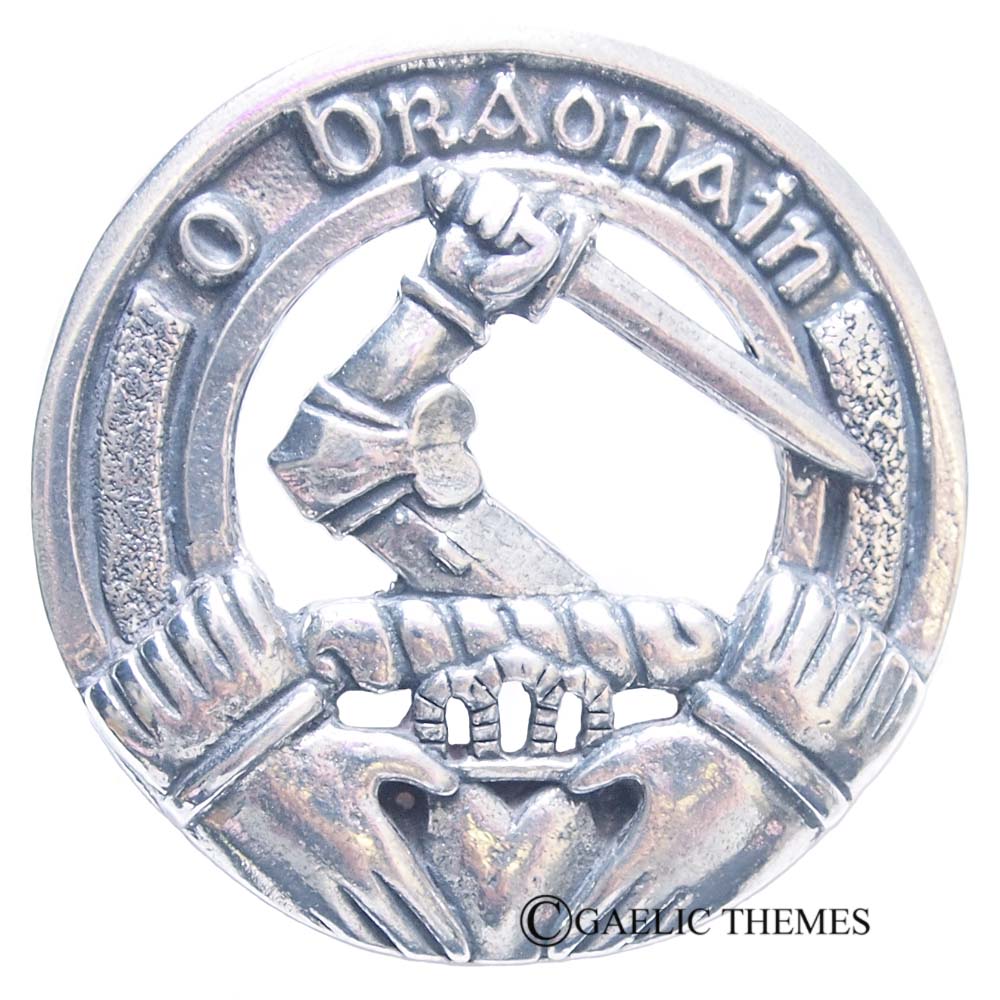 A silver cap badge displaying "dragonnain," categorized as a Special Order Premium Irish Clan Crest.