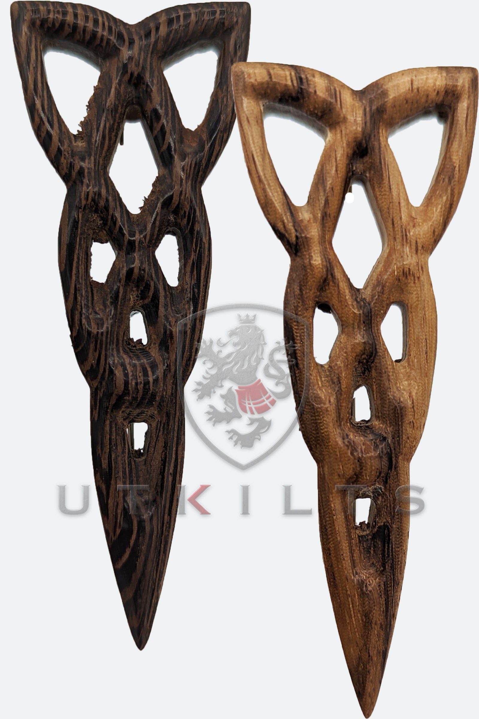 Two wooden tridents featuring a cross design, showcasing a premium Celtic weave kilt pin crafted from wood.