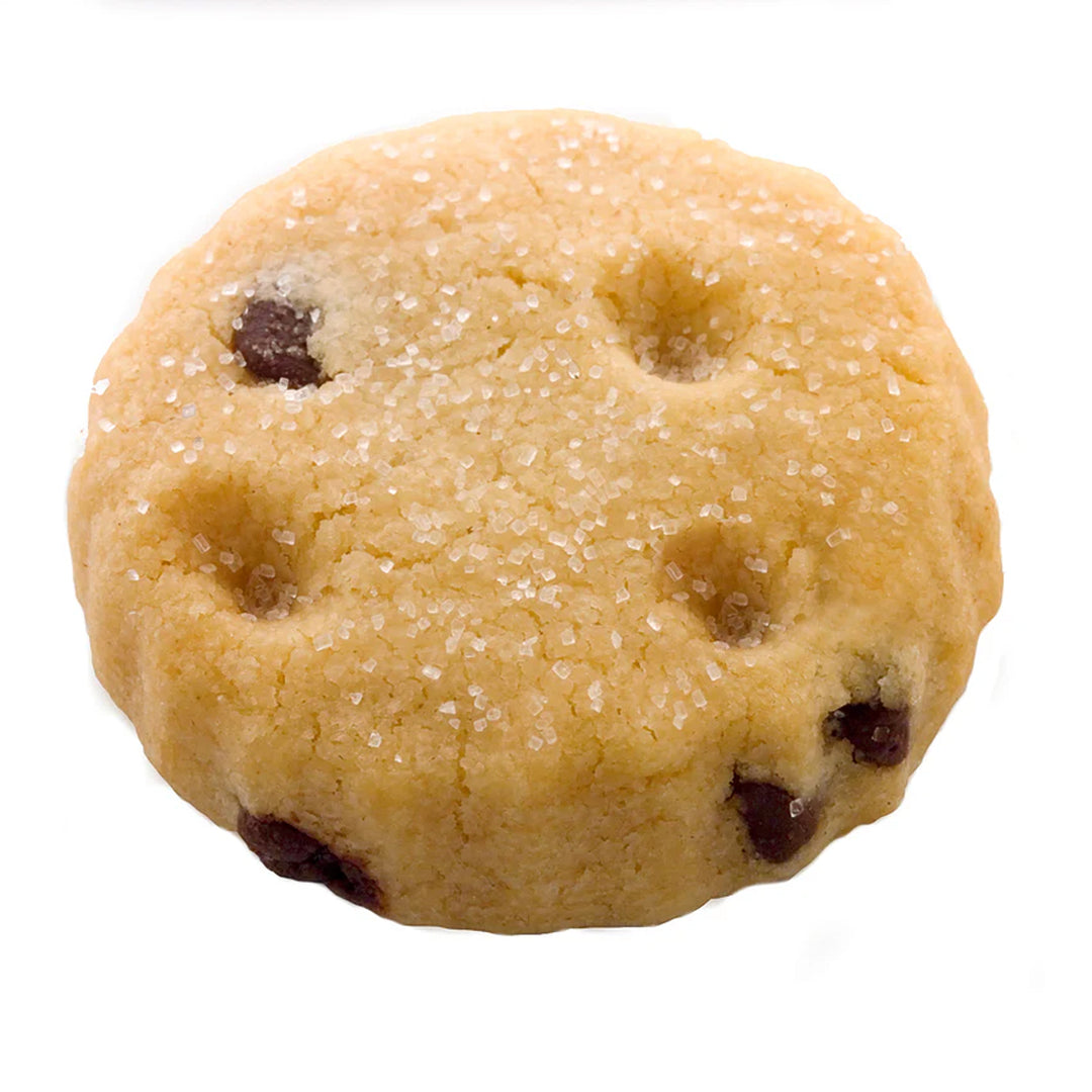 A freshly baked chocolate chip cookie on a white surface, highlighting its golden-brown color and chocolatey goodness.