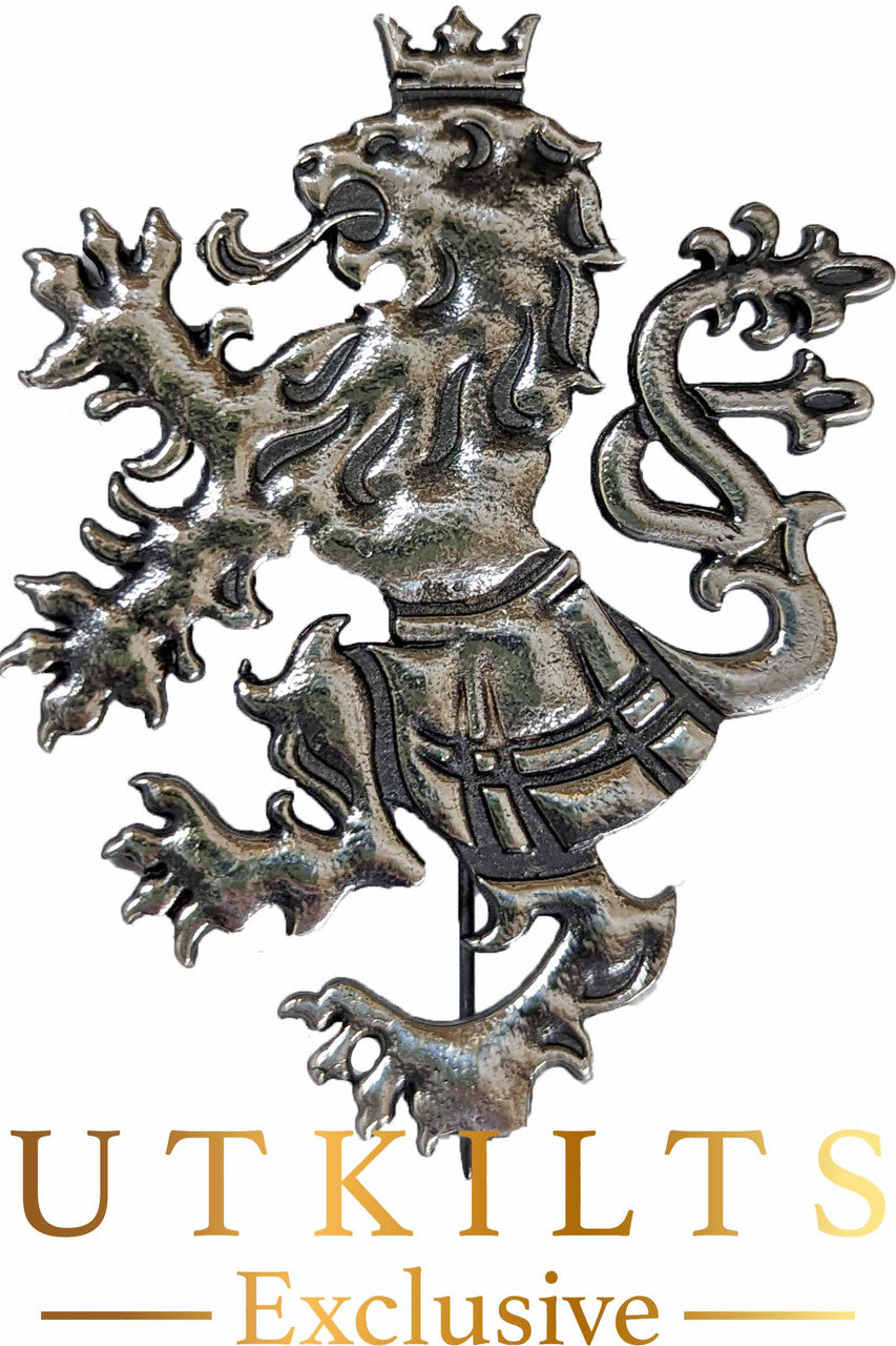 A metal lion sculpture featuring the words "UTKILTS EXCLUSIVE" prominently displayed on its surface.
