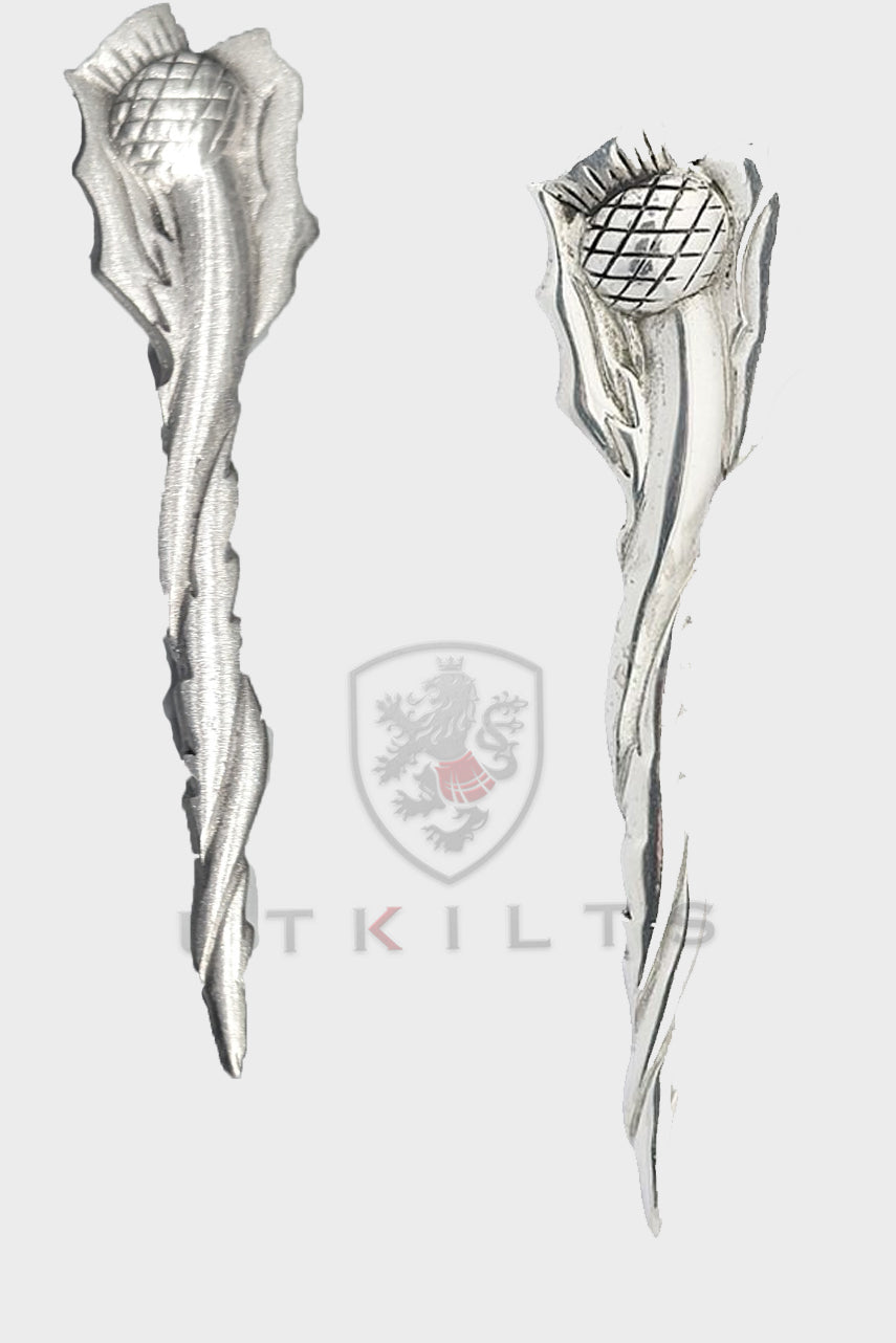 A pair of premium silver kilt pins adorned with delicate flower motifs, highlighting a long twist thistle design for added elegance.