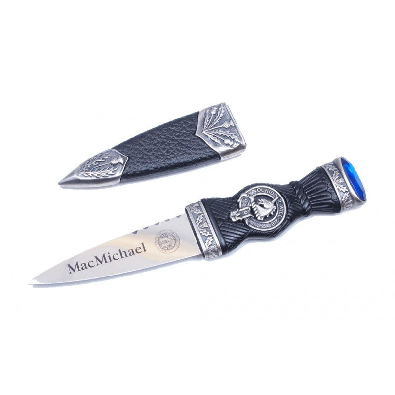 A blue-bladed knife showcasing a Scottish crest, part of a premium collection with over 220 clans to choose from.