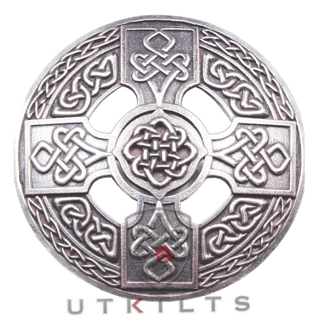 A Celtic cross pendant featuring intricate Celtic designs, showcasing its unique craftsmanship and cultural significance.