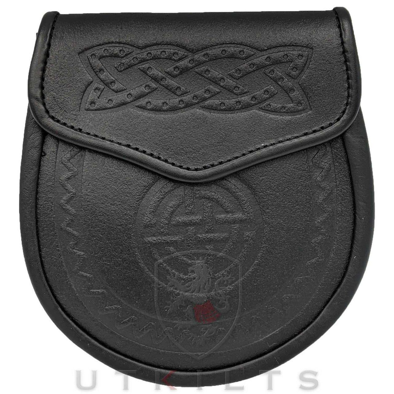 A black leather pouch featuring an intricate Celtic design, showcasing craftsmanship and cultural heritage.

