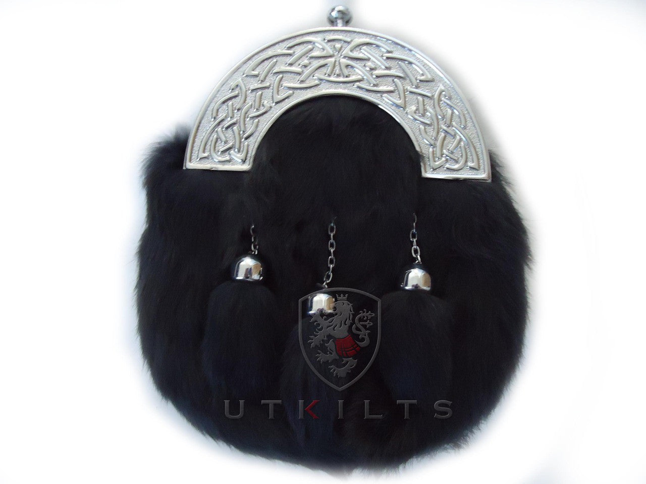 A black purse featuring a silver buckle and two decorative bells, designed as a formal dress gray fur sporran.