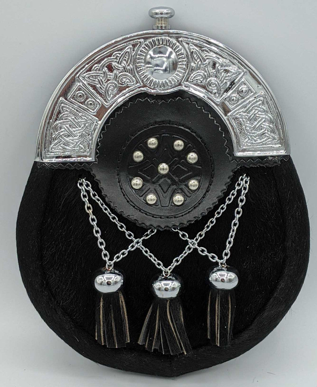 A black purse featuring tassels and a silver chain, designed for formal occasions, ideal for weddings and elegant events.