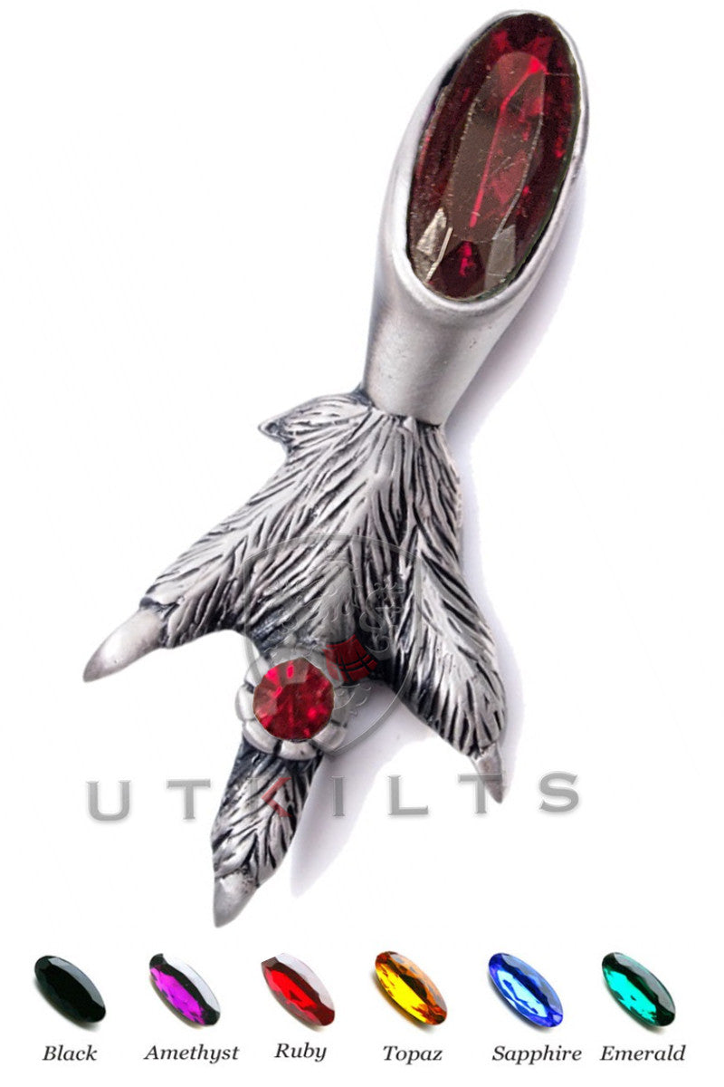 A beautifully crafted silver and red stone pendant adorned with an array of colorful hues, highlighting its artistic appeal.