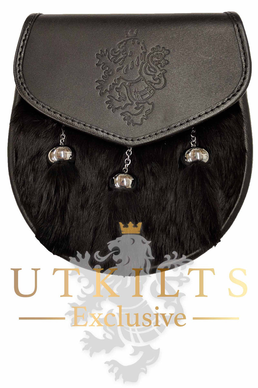 Elegant black purse adorned with fur and metal bells, showcasing the unique design of UTK Exclusives.