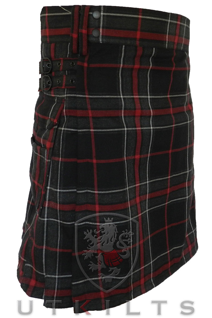 A black and red tartan kilt featuring a red and white check pattern, designed as the Standard Spirit of the Highlander Utility Kilt.