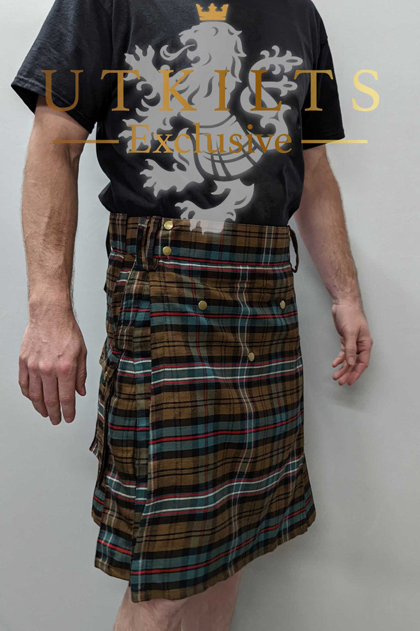 A man in a kilt paired with a black shirt and black t-shirt, showcasing a stylish front-side view for UTK Exclusives.